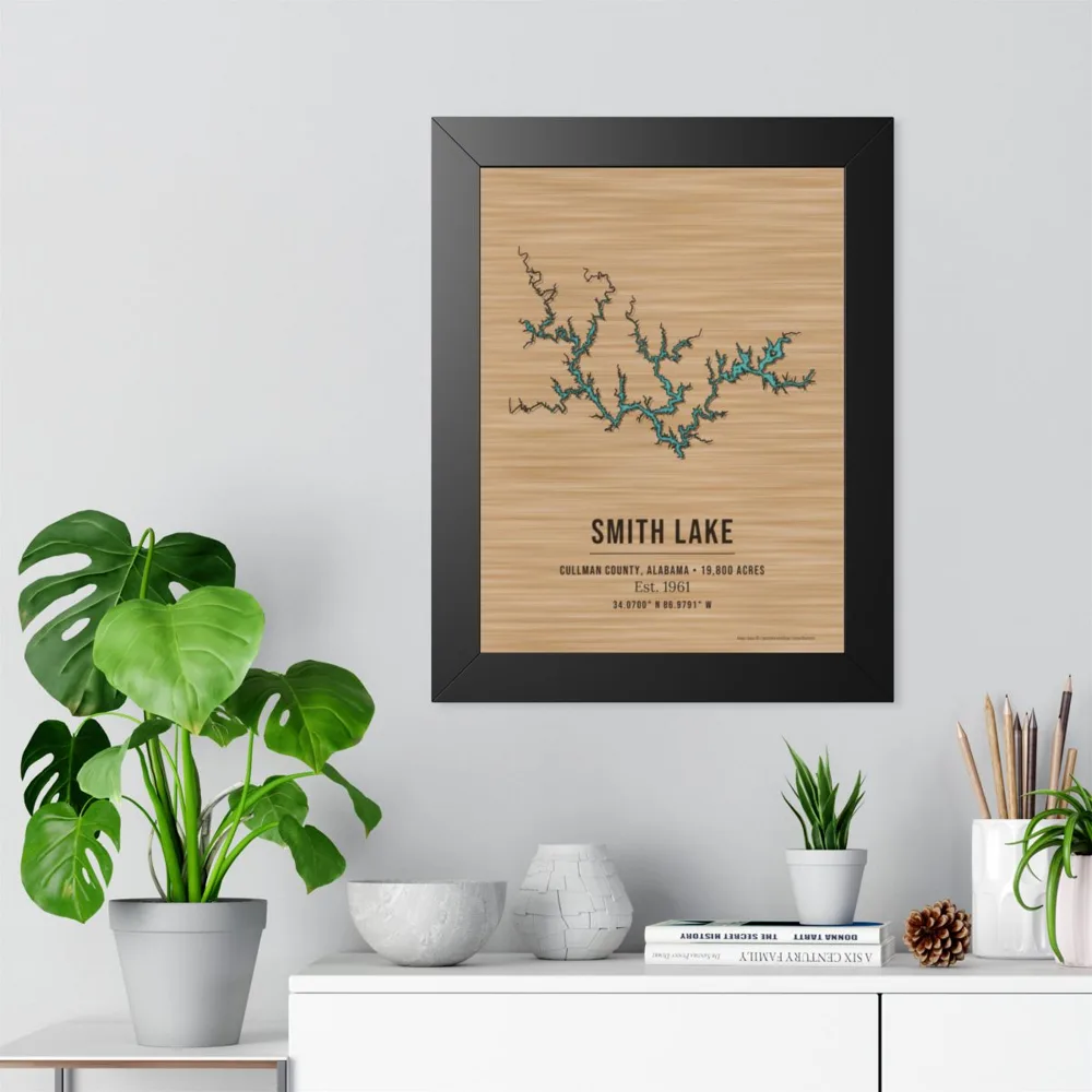Example: framed lake map of Smith Lake, Alabama, in teal on a wood-tone print, hanging above a shelf