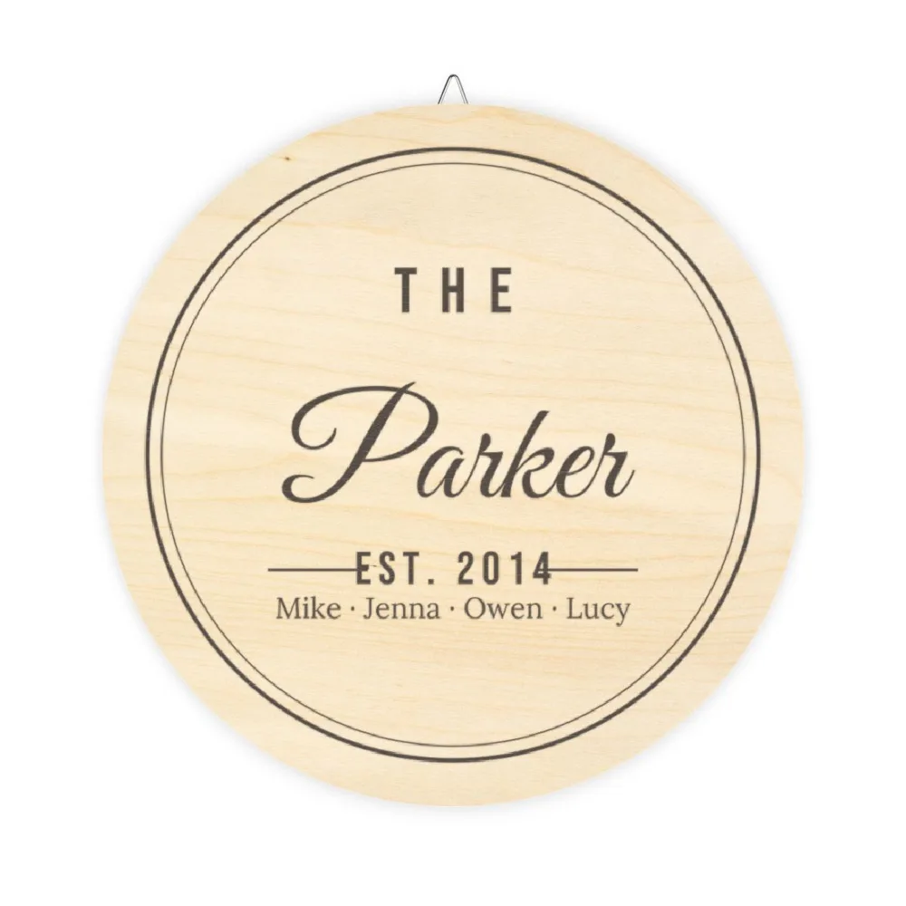 Example: round wood sign reading The Parker, EST. 2014, with four first names