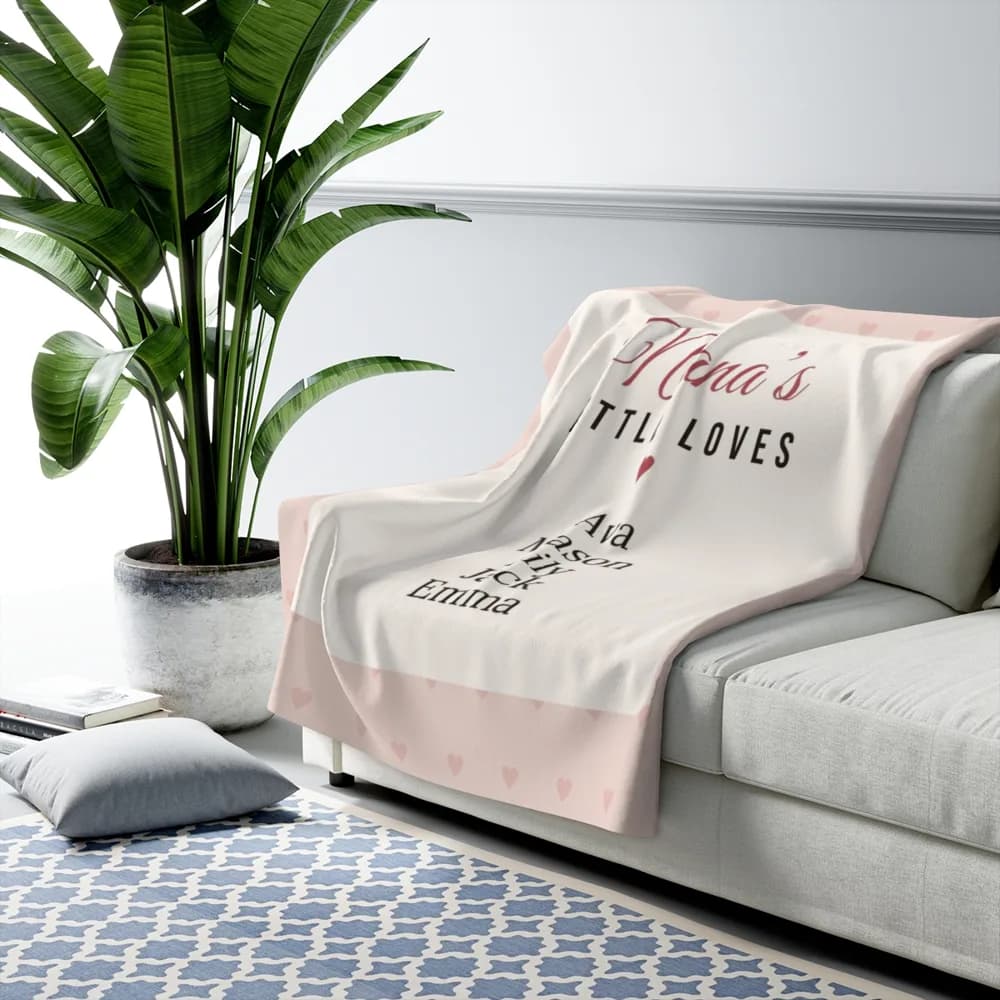 Example: Nana’s Little Loves blanket with five grandkids’ names on a sofa