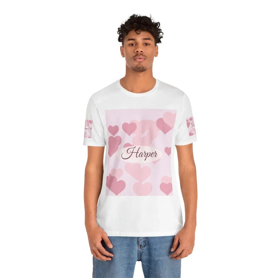 Example: tee with the name Harper on a hearts pattern, worn