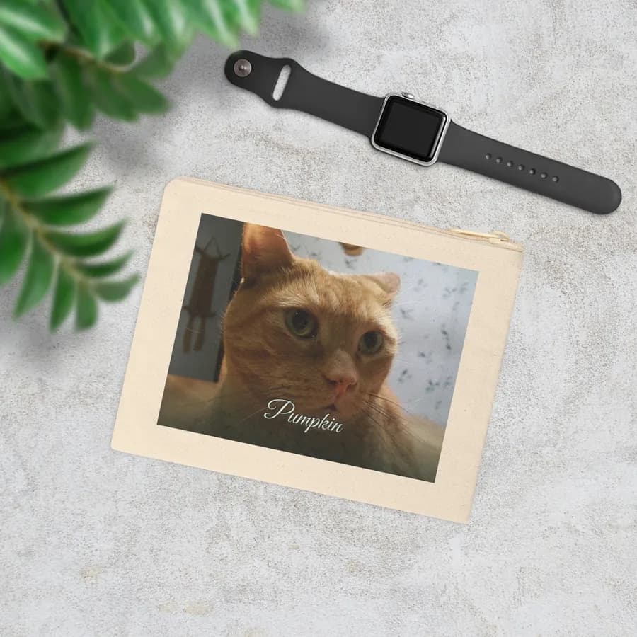 Example: zipper pouch with a ginger cat photo on a table