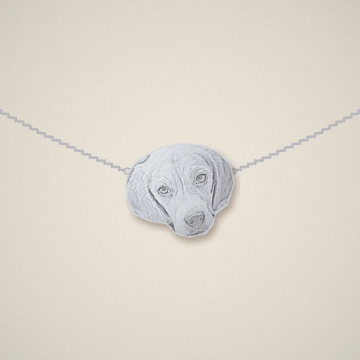 Illustration: silver bracelet with one engraved beagle-face charm